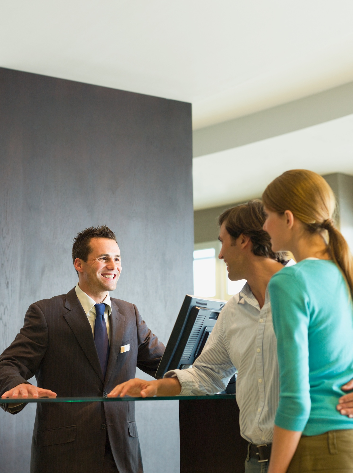 Couple checking into a hotel